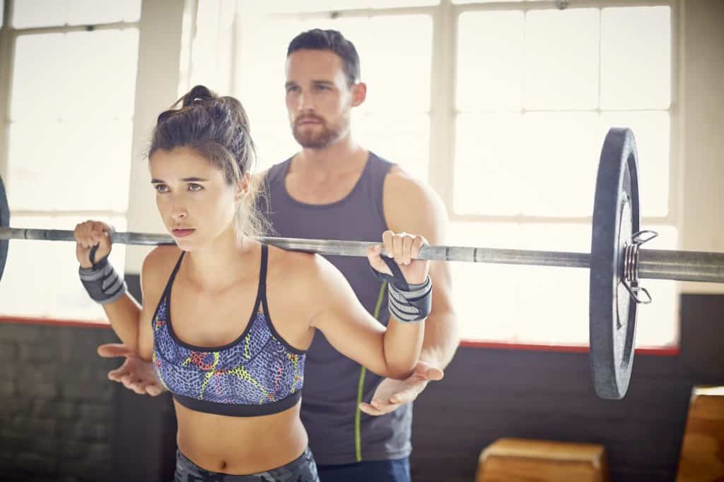 hacer deporte con un entrenador